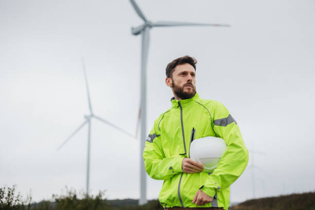 istock Professional Maintenance Engineer Working at Wind Turbine Farm 2171977278
