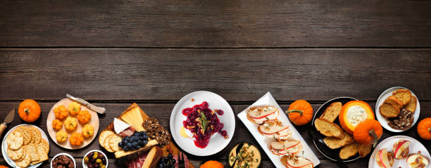 Autumn theme appetizer bottom border against a dark wood banner background