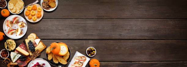 istock Autumn theme appetizer corner border against a dark wood banner background 2171988518