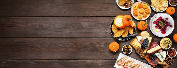 istock Autumn theme appetizer side border against a dark wood banner background 2171988521