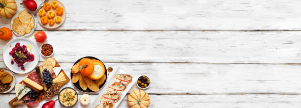istock Fall theme appetizer corner border against a white wood banner background 2171988523