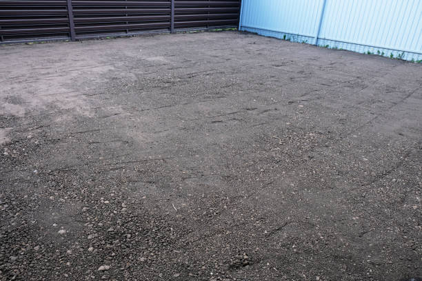 istock Preparing the site for sowing lawn grass, leveling the soil 2171989571