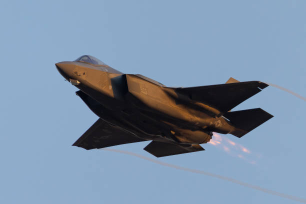 istock Close view of a F-35A Lightning II approaching in beautiful sunset light 2171991447