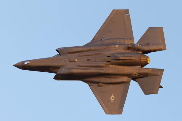 istock Bottom view of a F-35A Lightning II  in beautiful sunset light 2171991464