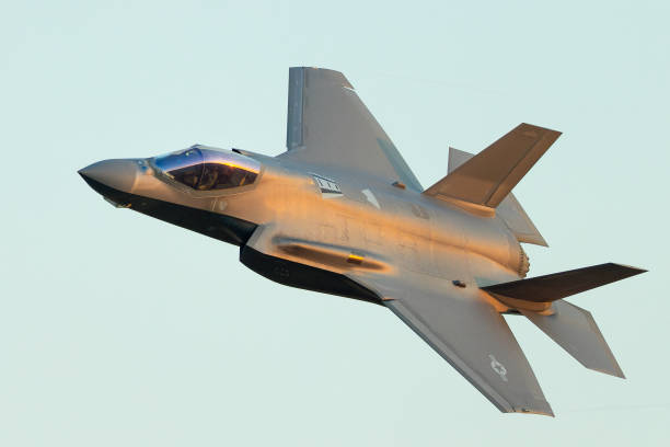 istock Close view of a F-35A Lightning II approaching in beautiful sunset light 2171991478