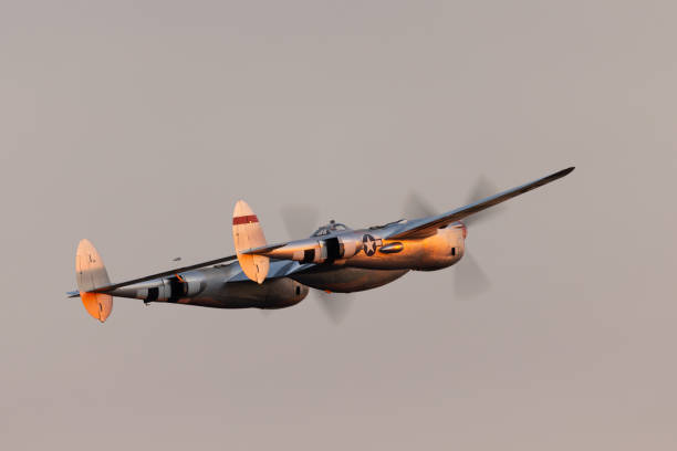 istock Very close tail  view  of P38 Lightning (WWII American fighter plane) in beautiful sunset light 2171991721