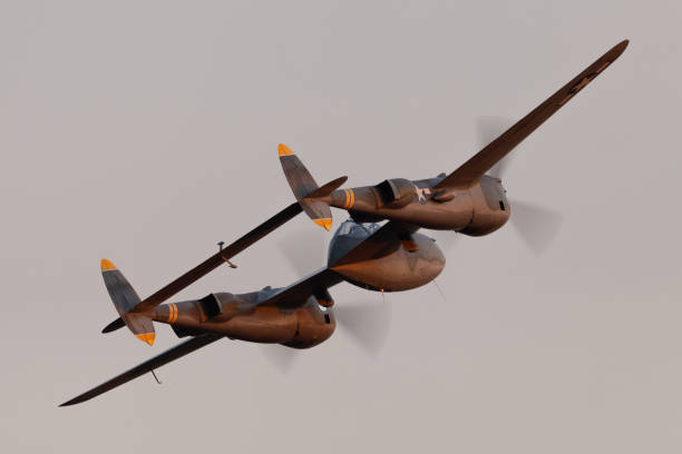 istock Very close tail  view  of P38 Lightning (WWII American fighter plane) in beautiful sunset light 2171991726