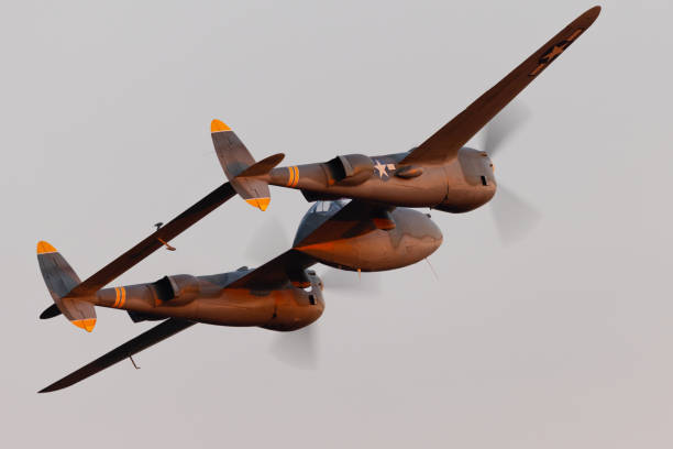 istock Very close tail  view  of P38 Lightning (WWII American fighter plane) in beautiful sunset light 2171991730