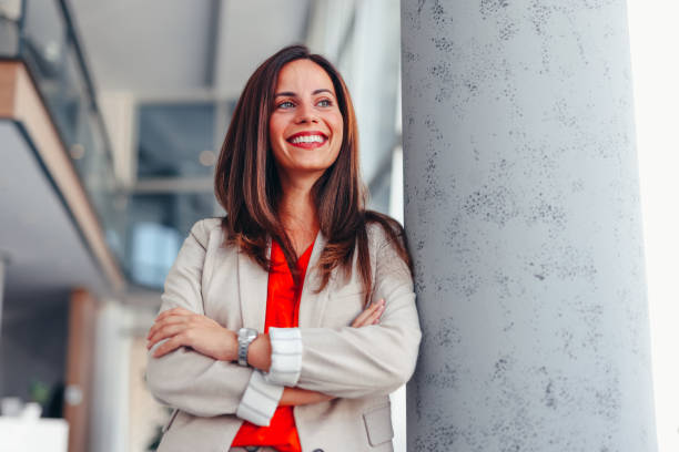 istock Smiling businesswoman posing in modern office 2171991886