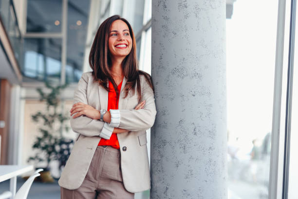 istock Smiling businesswoman posing in modern office 2171991895