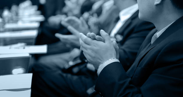 istock Group of business people clapping in a row 2171992641