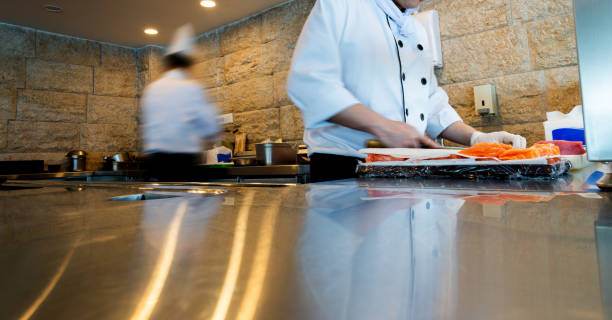 istock Japanese chef making sashimi in the kitchen 2171992760