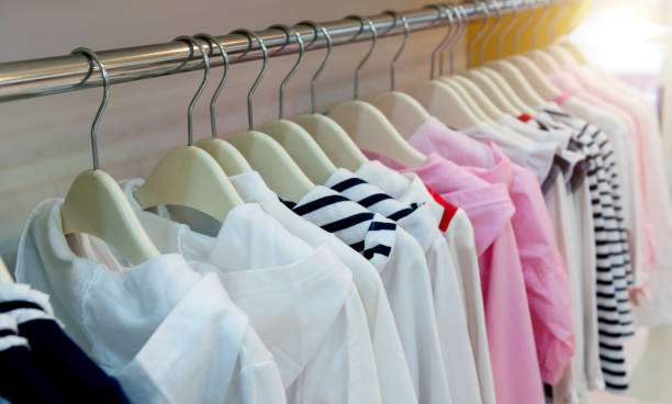 istock Row of children clothes on hangers 2171992907