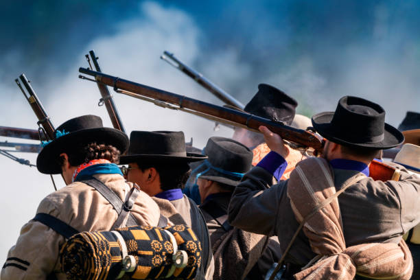 Huntington Beach CA USA - August 31, 2024: Confederate soldiers firing on Union troops, the Huntington Beach Historical Society hosts, the 31st annual Civil War Days, a reenactment of the Civil War at Huntington Beach Central Park.
