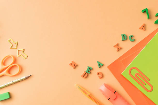 istock School supplies on yellow background. Back to school, education concept 2171995618