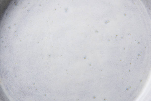 istock Ceramic plate, stone texture. Grey background. Close up. Top view. 2171997107