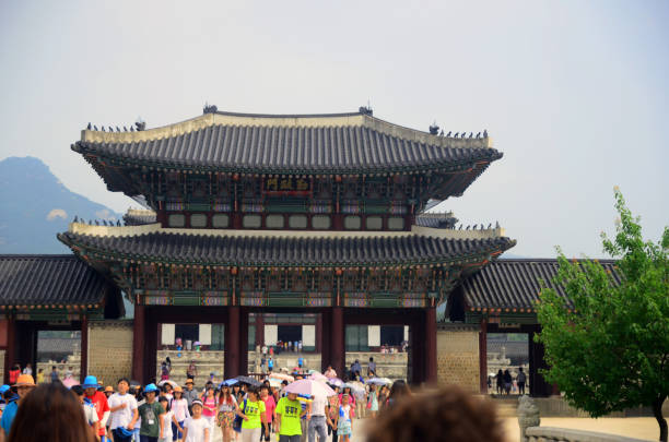 Gyeongbokgung Palace was the main royal palace of the Joseon dynasty. Built in 1395, It retains the original Gyeonghoeru Pavilion, a prime example of Joseon architecture, and the Hyangwonjeong Pavilion and pond.  it is located in northern Seoul, South Korea, on a July 31, 2013