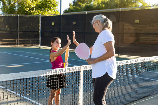 istock Grandma playing pickleball with granddaughter 2172005652