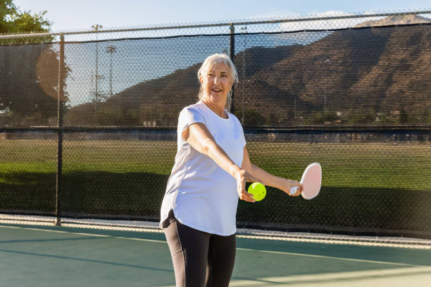 istock Senior woman playing pickleball 2172005795