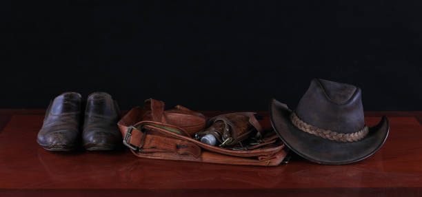 istock vintage hat and traveler things on the table 2172007103