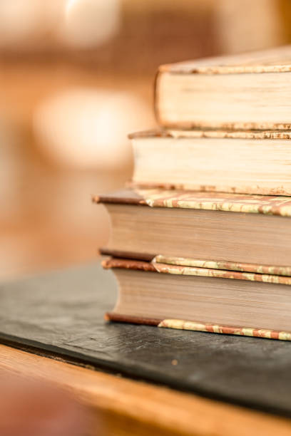 istock Vintage books on wooden table.. 2172009223
