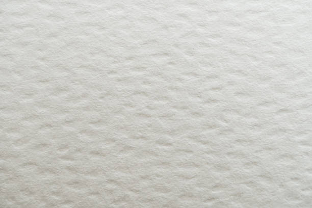 istock Close-up of textured paper surface, showcasing its unique pattern. Ideal for backgrounds, crafts, and artistic projects. 2172011285