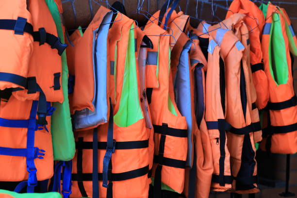 istock A collection of life jackets hanging on a rack, ready for use 2172016772