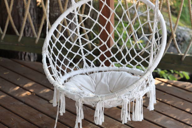 istock A white chair sits atop a wooden deck with a beautiful view 2172016868