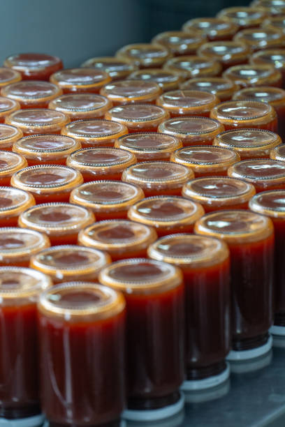 istock Artisan Rosehip Jam Jars in Factory Setting 2172028908