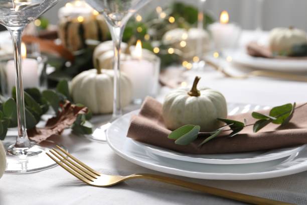 istock Beautiful autumn table setting, pumpkin and eucalyptus branch, closeup 2172040502
