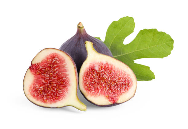 istock Whole and cut ripe figs with green leaf isolated on white 2172040934