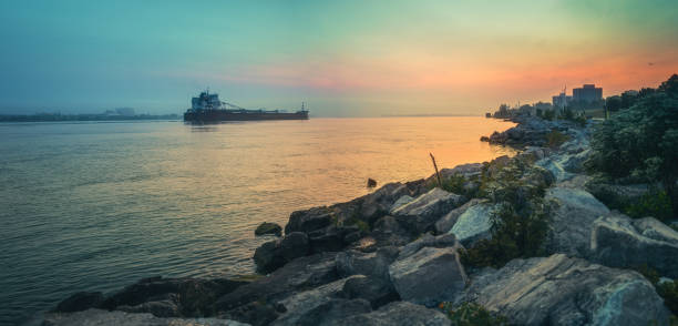 A cargo ship on the Detroit River at dawn.  Photo taken from Windsor, Ontario.