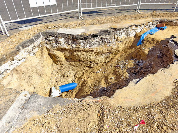 istock Sinkhole in a street due to construction work 2172042081