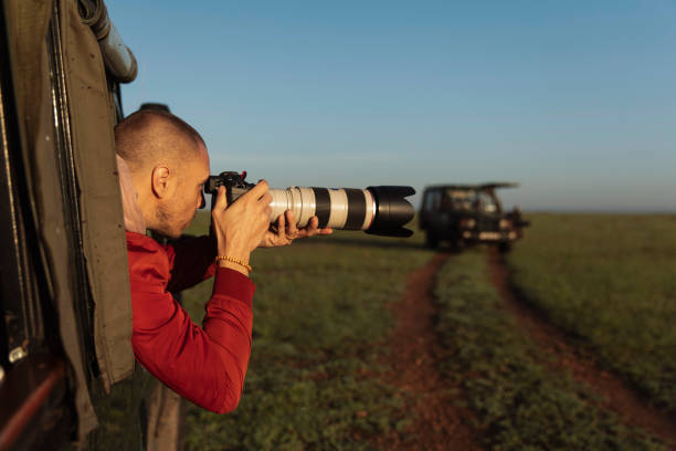 istock Photographer at safari 2172042807