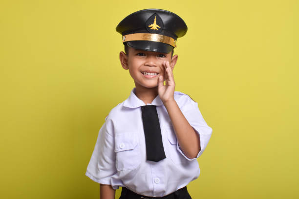 istock Asian boy Airplane pilot whispering with smiling mouth 2172044310