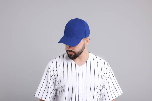 istock Man in stylish blue baseball cap on light grey background 2172044449