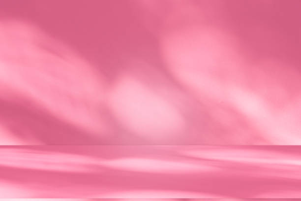 istock Wall interior background, studio, and backdrops show products. with shadow from window color white and pink light. background for text insertion and presentation of product 2172046582