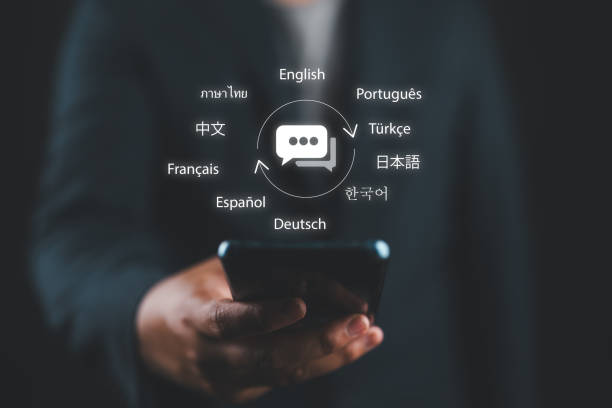 istock Translator app and languages education concept. Person use mobile smartphone with with translator app to translation of foreign languages. language course and e-learning. 2172047123