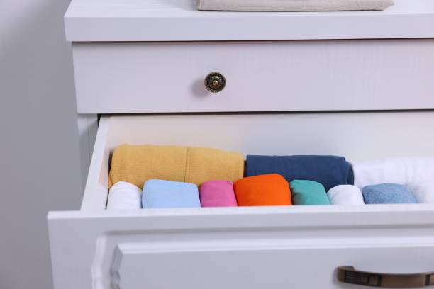 istock Open drawer with rolled shirts indoors. Organizing clothes 2172047668