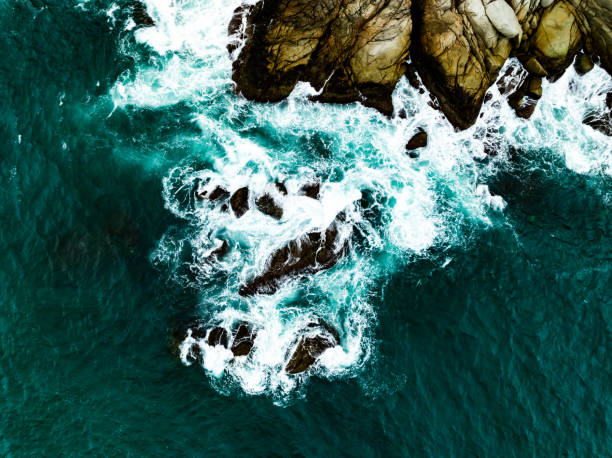 istock Dark waves crashing on seashore,Top view sea space nature background 2172048006