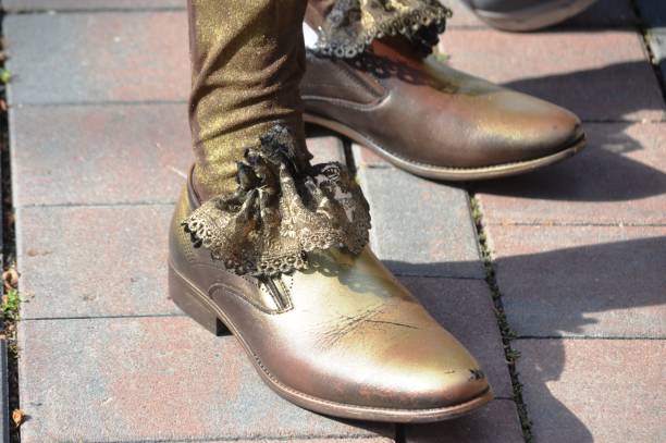 Close detail of shoes, part of costume at the first day of Venice's Carnival.