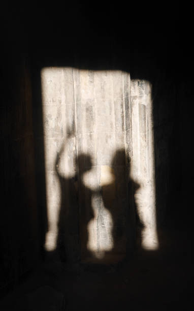 istock Two scary thriller blurry figure shape in silhouette black with backlight in ancient place, shadow haunted on Halloween, concept of UFO or Aliens 2172056907