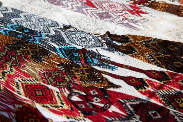 istock Of colorful beaded patterns on a fabric showcasing intricate designs and vibrant colors. 2172062103