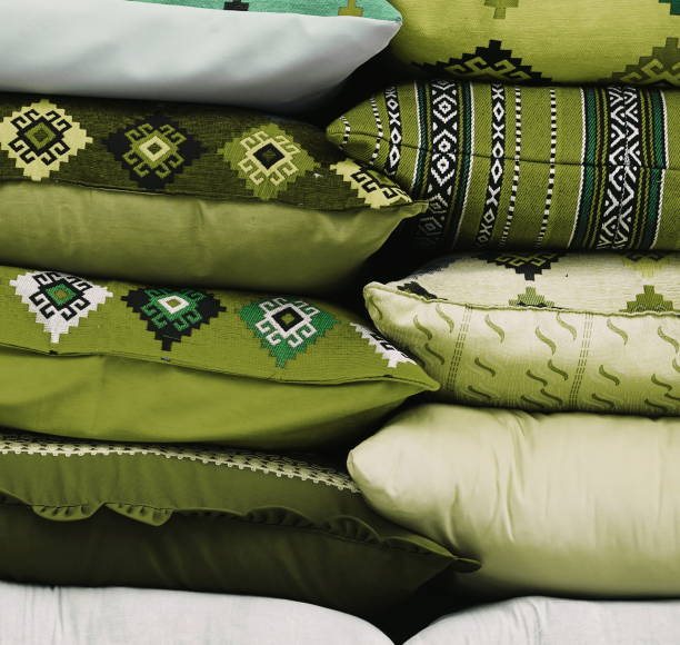 istock Stacked Decorative Pillows Traditional Patterns Close-Up Color 2172065535