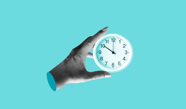 istock Hand holding white time clock against on light blue background. Art collage digital pop modern art 2172065884