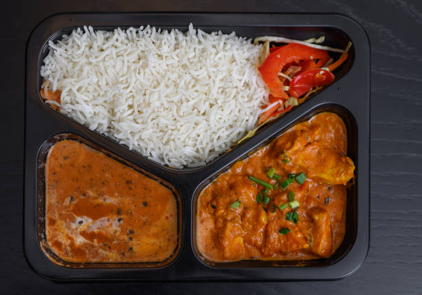 istock Catering order in a box from an Indian restaurant, rice, meat and sauce 2172068154