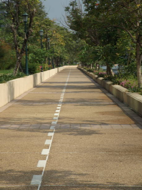istock walkway in the park 2172069446
