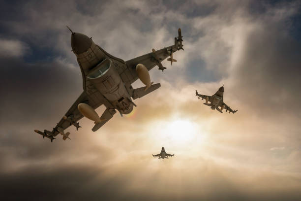istock Jet aircrafts flying over the clouds. 2172072697