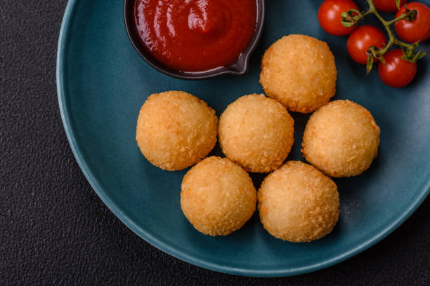 istock Fast food cheese balls breaded with salt and spices 2172072783