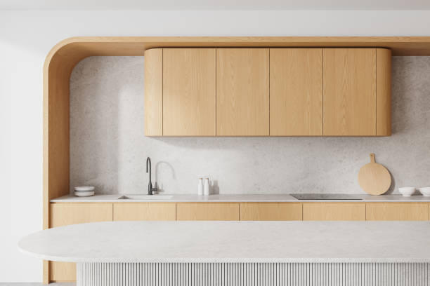 istock Cozy home kitchen interior with cooking cabinet, bar island and kitchenware 2172073078